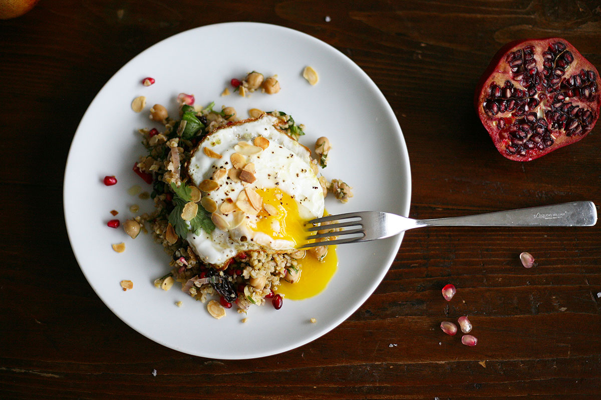Warm freekeh and chickpea salad with pomegranate
