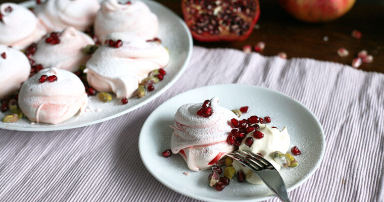 Rose meringues with pomegranates and pistachios